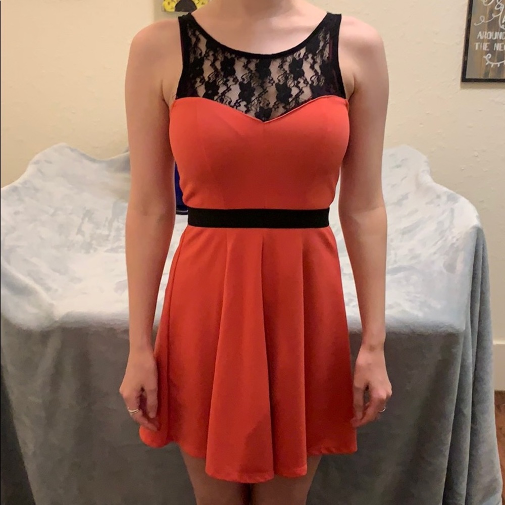 Small coral/salmon dress with black lace